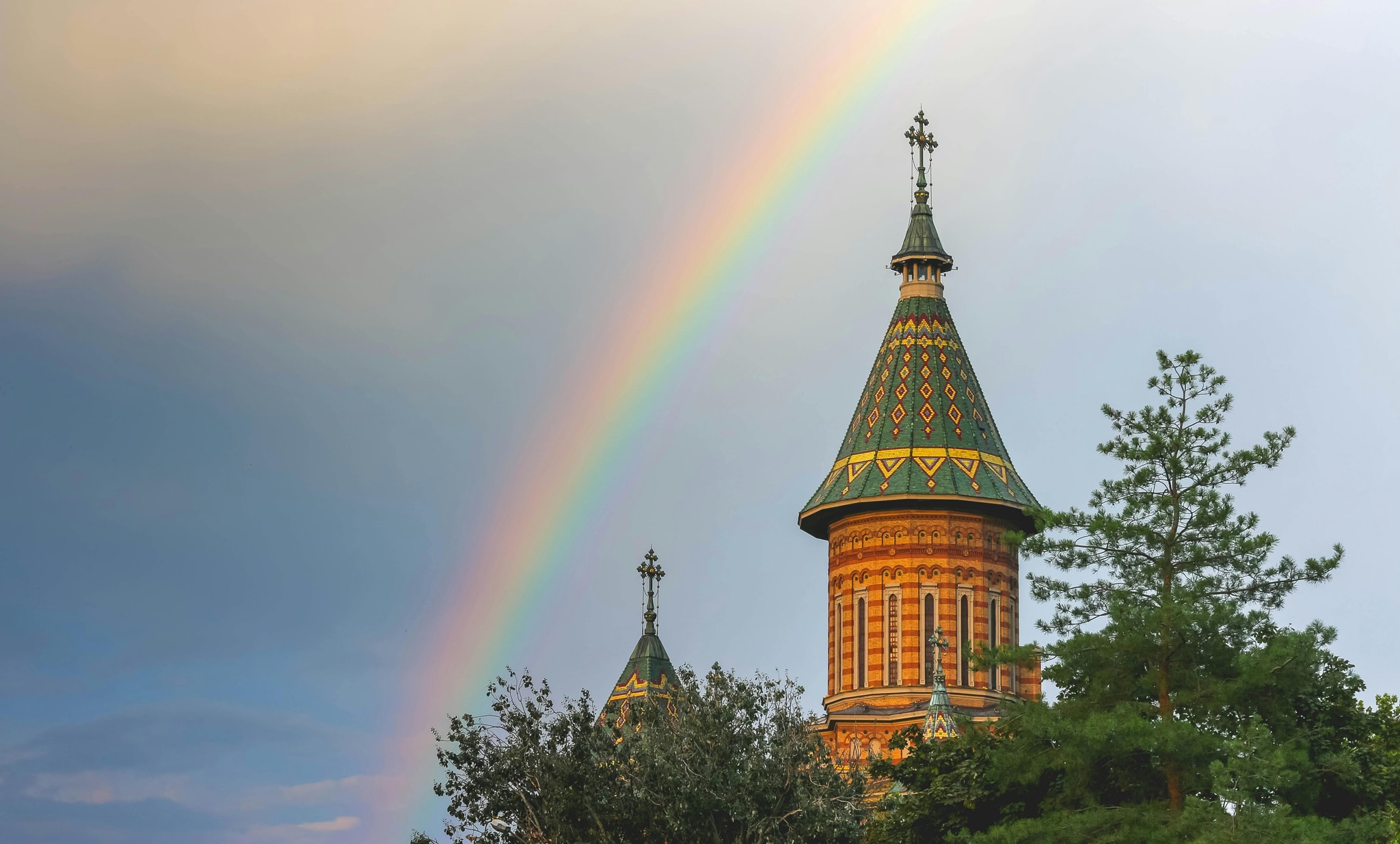 Cathedral tower with rainbow